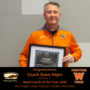 WHS Football coach Dave Hajek poses with his award for Distirct 4 coach of the year 2022 by the Washington State Football coaches association