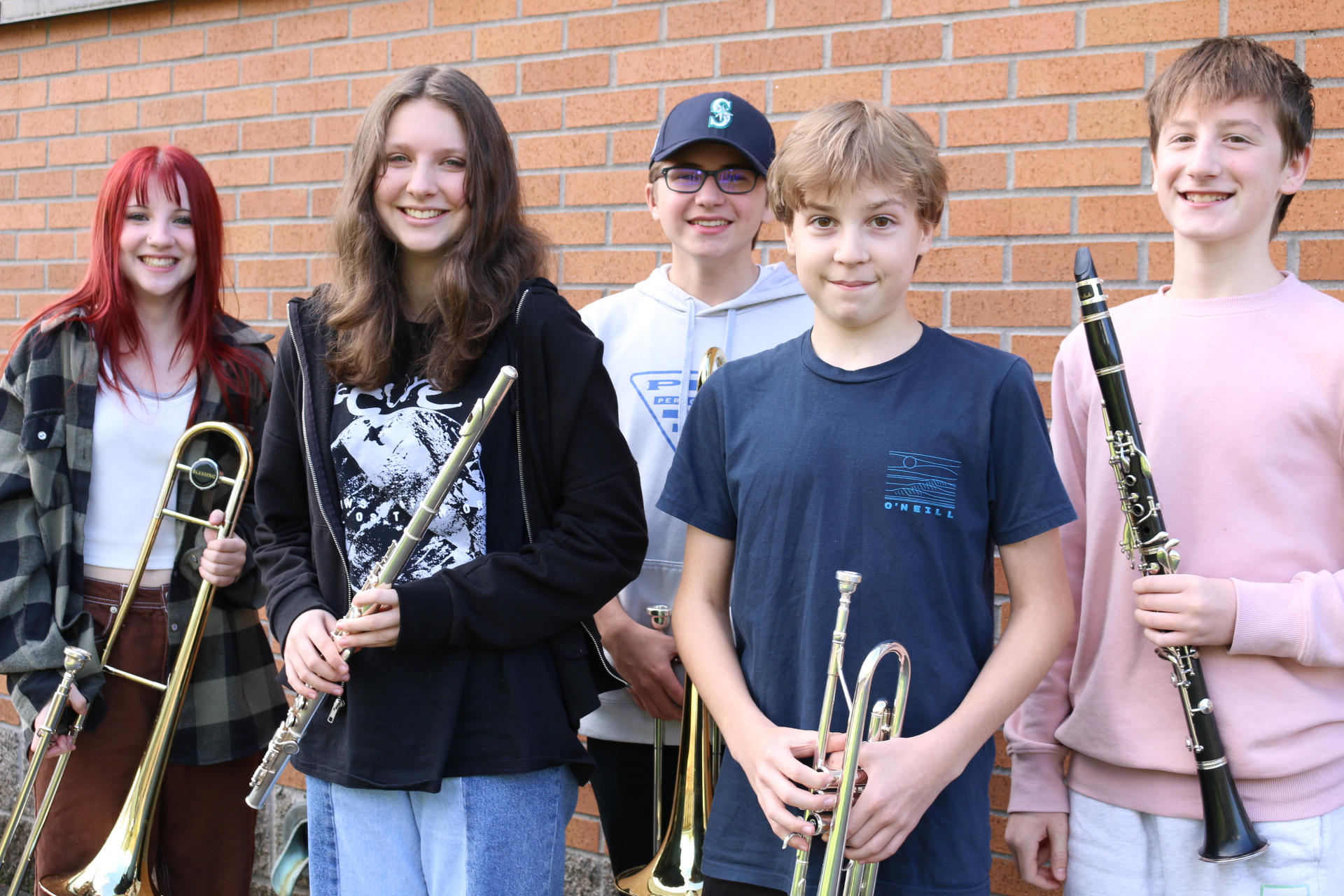Students selected for north county honor band pose with their instruments