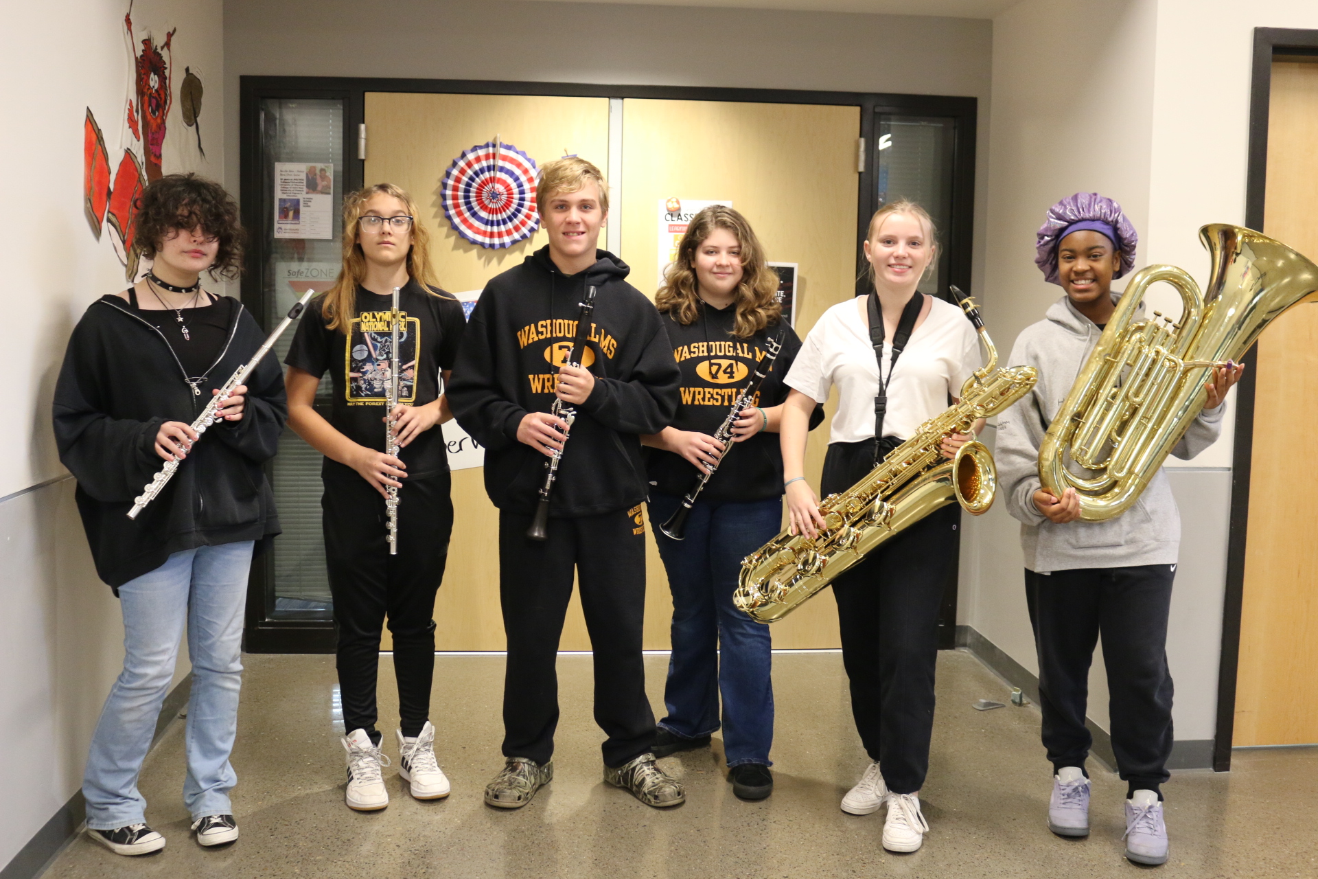 JMS students selected for north county honor band pose with their instruments