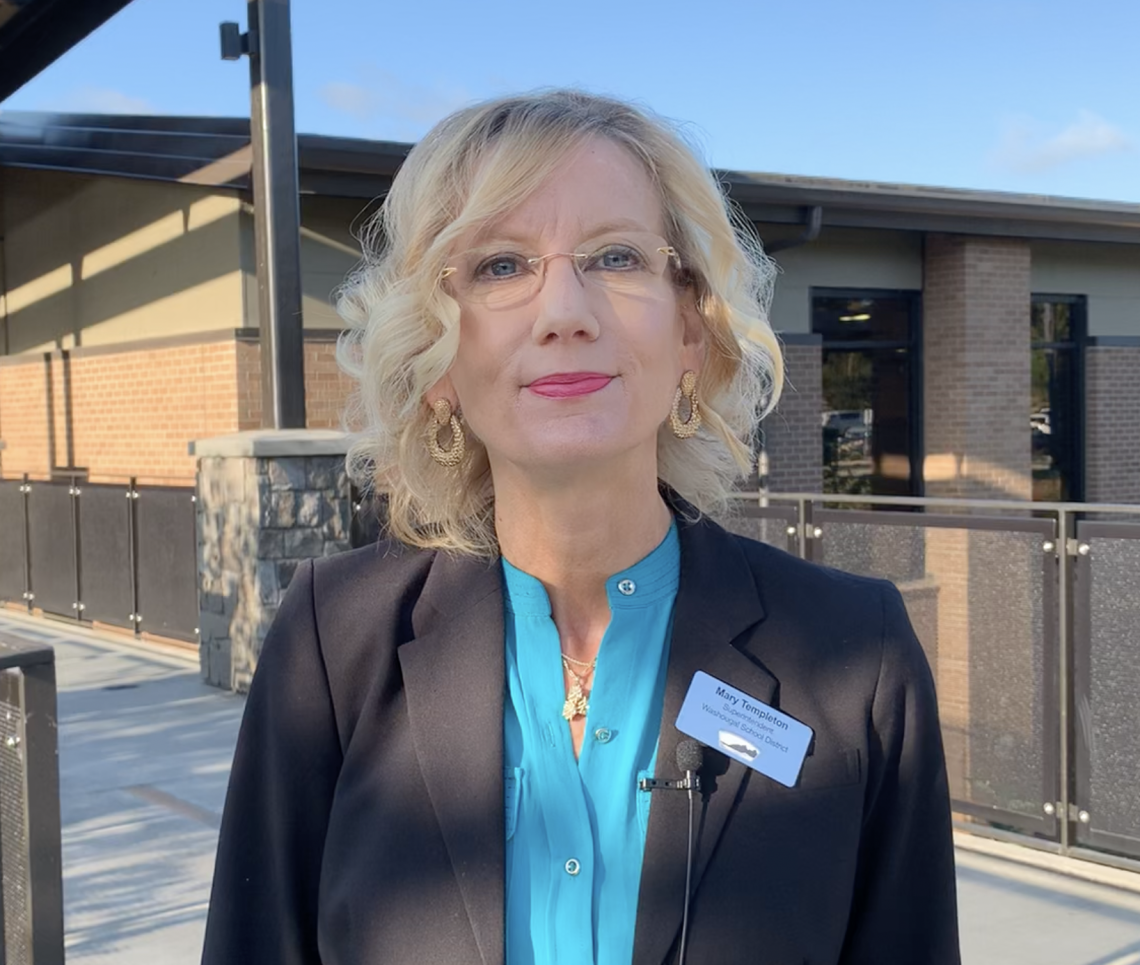 Dr. Mary Templeton in front of Jemtegaard Middle School