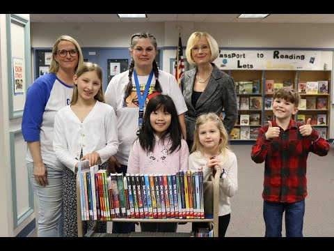 Students, staff, and boosters join to celebrate new books for the Gause library, thanks to fundraising by the Gause Boosters!